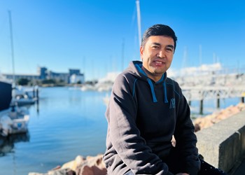From a land-locked war zone to working on Newcastle Harbour, the inspiring story of a refugee who has a team of boaties keeping him afloat  IMAGE